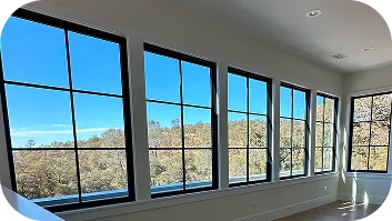 Home interior with large windows providing abundant natural light and outdoor view